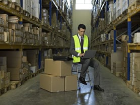 Man in a Warehouse Economic Order Quantities Planning Management
