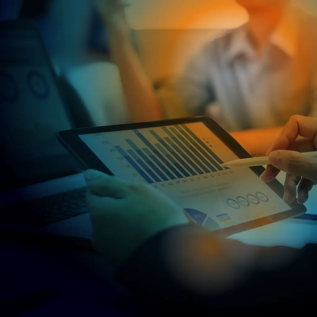 Hands holding a tablet and pen