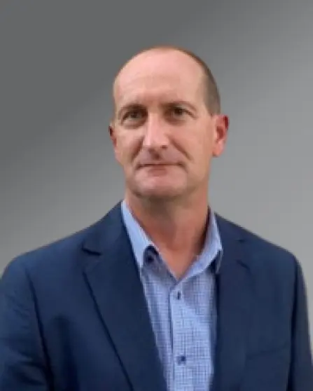 Aidan Ward, consultant profile photo (grey background)