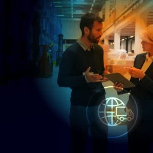 Man and woman taking over clipboard in warehouse